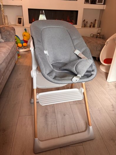Mash high chair with changeable baby seat.