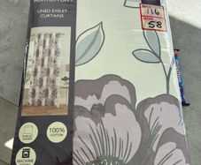 Lined eyelet curtains