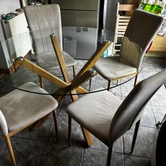 Glass Top Table and Four Chairs