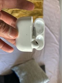 AirPods Pro right hearing piece and case.