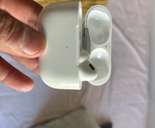 AirPods Pro right hearing piece and case.