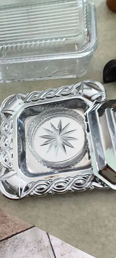 Vintage glass kraft square butter cheese dish lid glass Insert 15.00 euro.Vintage Pasabahce clear glass butter dish 24.00 euro, Fleur De Lis Cast Iron Door Stop Wedge Antique gold Black 4x3.5x7.75 Inch 34.00 euro , Vintage Englshe browne larg milk jug 18.