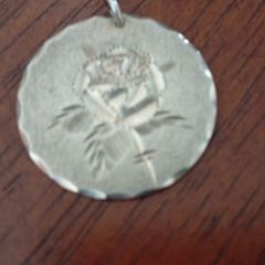 Sterling silver charm.