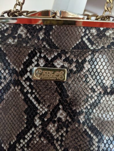Handbag by Carlos Santana