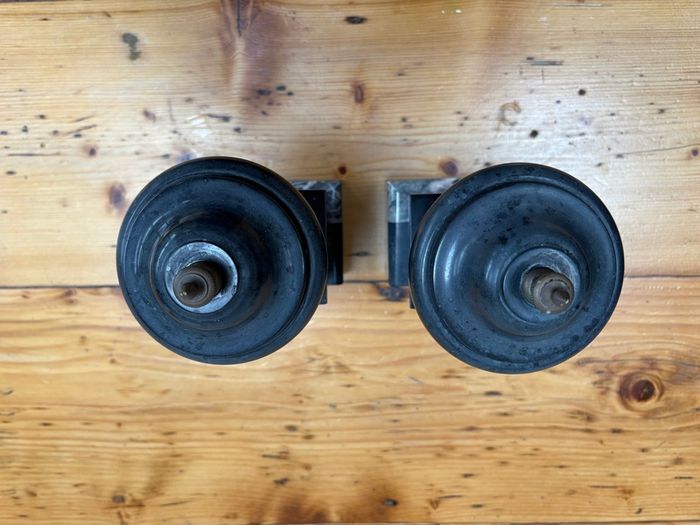 Matching pair of antique marble, slate and brass ornaments.