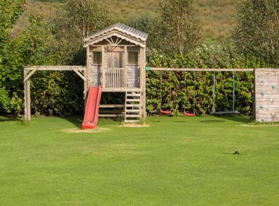 Playhouse and swings