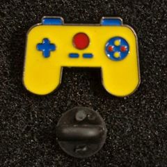 Game controller, pin back badges.