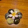 Modern Green Bracelet with a White Flowery Clip Image 5