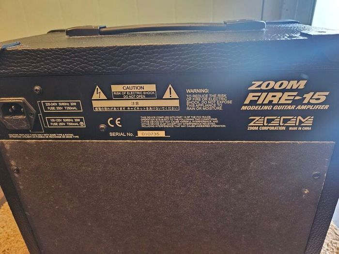 Aria electric guitar with Zoom Fire-15 Amp