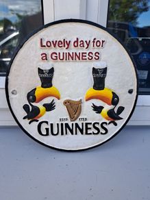 Guinness  twin toucan cast iron sign