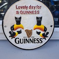 Guinness  twin toucan cast iron sign