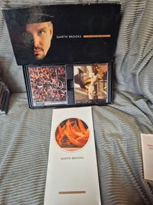 Various box sets and single albums all unscratched in great shape CDs..Garth Brooks,niel diamond etc