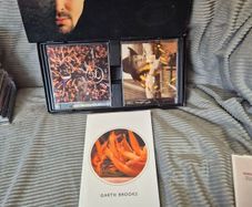 Various box sets and single albums all unscratched in great shape CDs..Garth Brooks,niel diamond etc