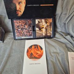 Various box sets and single albums all unscratched in great shape CDs..Garth Brooks,niel diamond etc