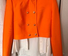 Women orange jacket Karen Millen