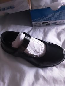 Girls black patent sketchers shoes