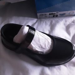 Girls black patent sketchers shoes