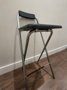 Foldable high stool used as a ladder