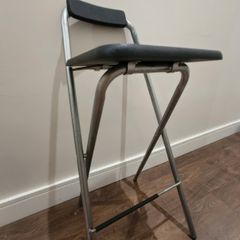 Foldable high stool used as a ladder