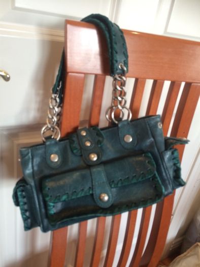 Hand bags. Rucksacks, clutch bags, purses