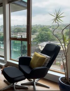 retro Ikea swivel armchair and footrest