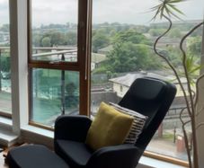 retro Ikea swivel armchair and footrest