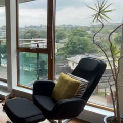 retro Ikea swivel armchair and footrest