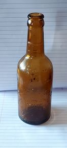 O Connor's kanturk 1/2 pint vintage bottle,,bottle seems to have a defect,around bottom of bottle, holds water no leeks,see pictures,sold as is ,lovely display advertising bottle, collectors items, buyer collects or pays postage thank you,