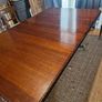 Mahogany Extendable Dining Table with Brass Castors Image 3