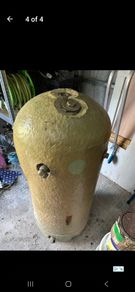 Hot water cylinder and unused radiator