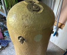 Hot water cylinder and unused radiator