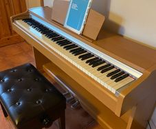 Yamaha piano and stool