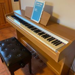 Yamaha piano and stool