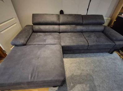 dark grey corner sofa with sleeping and storage