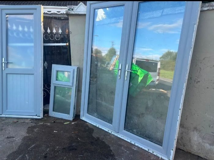 Grey UPVC French doors, single door and window