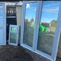 Grey UPVC French doors, single door and window