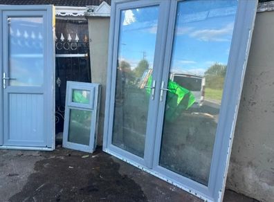 Grey UPVC French doors, single door and window