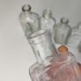 193 - Set of 7 Vintage Clear Glass Collectible Decorative Bottles Image 6