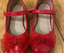 Patent red flat pumps with bows size 11