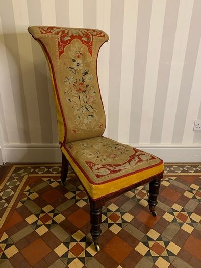 Victorian rosewood prie dieu or prayer nursing chair with original needlepoint upholstery.