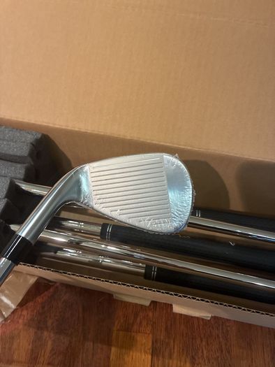 Taylormade Qi Irons 5 to SW regular flex still in the box 9 iron and 5 iron hit once wrappers still on irons