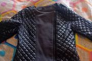 ladies jacket. Padded design. Black with grey material. Size small