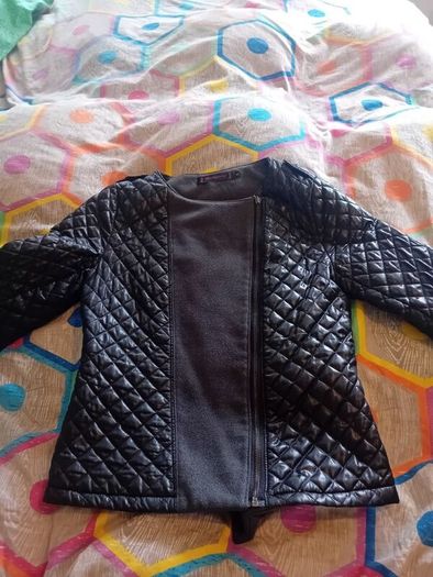 ladies jacket. Padded design. Black with grey material. Size small
