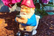 Funny dwarf statue for garden