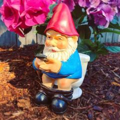 Funny dwarf statue for garden