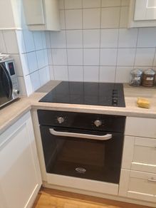 cooker an extractor fan and hob