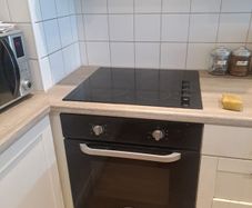 cooker an extractor fan and hob