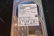 HGST Ultrastar 4TB enterprise-grade hard drive, 3.5" SATA 6.0 Gb/s, 7200RPM. Manufactured Dec 2014.