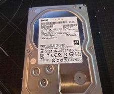 HGST Ultrastar 4TB enterprise-grade hard drive, 3.5" SATA 6.0 Gb/s, 7200RPM. Manufactured Dec 2014.
