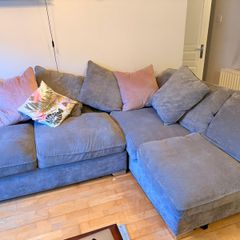 Grey corner couch incl. matching pouffe